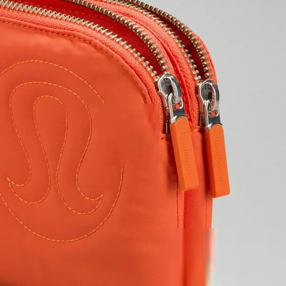 Lululemon Now and Always Puffy Pouch Wristlet in Orange - Picture 2 of 8